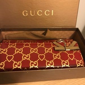 Gucci red patent leather wallet